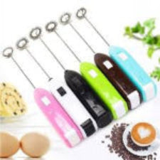 Set of colorful handheld milk frothers with a blurred background
